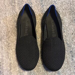 Rothy's Black Knit Slip-On Flats with Blue Trim